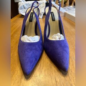 Nine West, medium purple, sling back 4 inch heels! Worn once. Size 8 1/2. In box